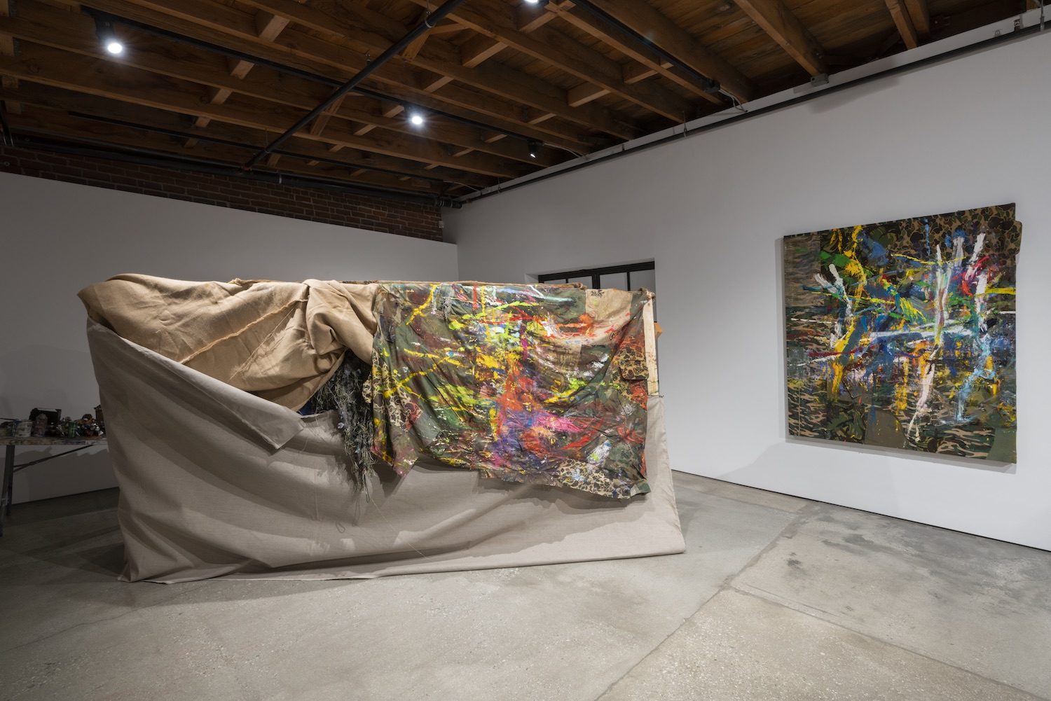 Installation view of A Doctor, a Painter, and an Alchemist Walk into a Bar, 2020